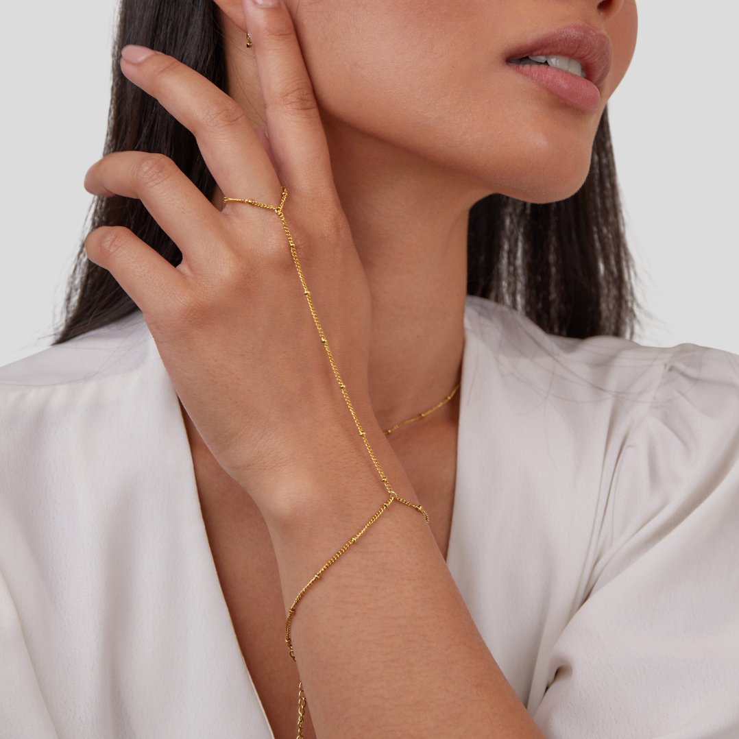 Draped Gold-Tone Hand Chain Bracelet