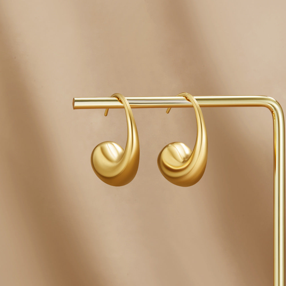 Gold-Tone Teardrop Earrings with a Fuller Curve