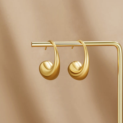 Gold-Tone Teardrop Earrings with a Fuller Curve