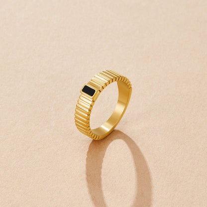 Ribbed Band Ring with a Dark Crystal Centre