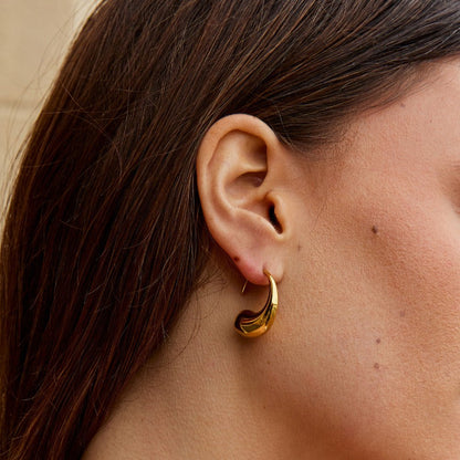 Gold-Tone Teardrop Earrings with a Fuller Curve