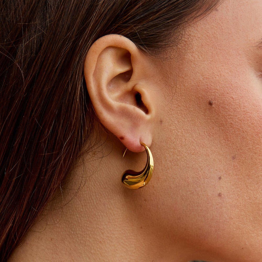 Gold-Tone Teardrop Earrings with a Fuller Curve