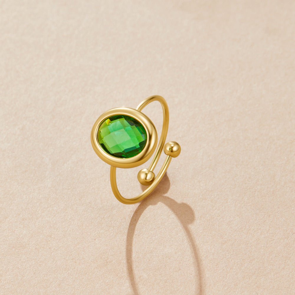 Gold-Tone Ring with an Emerald Green Crystal