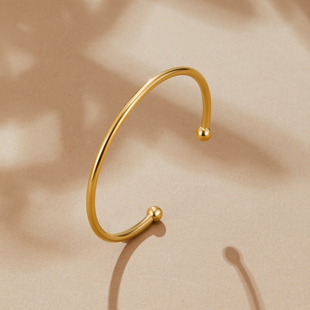 Penelope Slim Polished Gold-Tone Bangle
