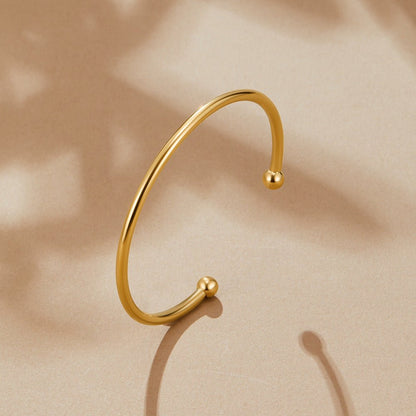 Penelope Slim Polished Gold-Tone Bangle