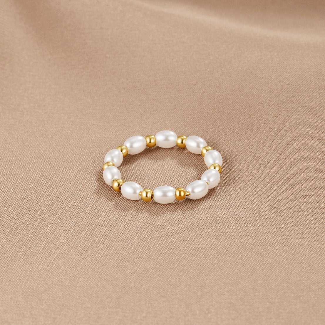 Kai Tiny Single Pearl on a Fine Band Ring