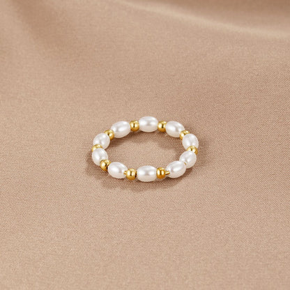 Kai Tiny Single Pearl on a Fine Band Ring