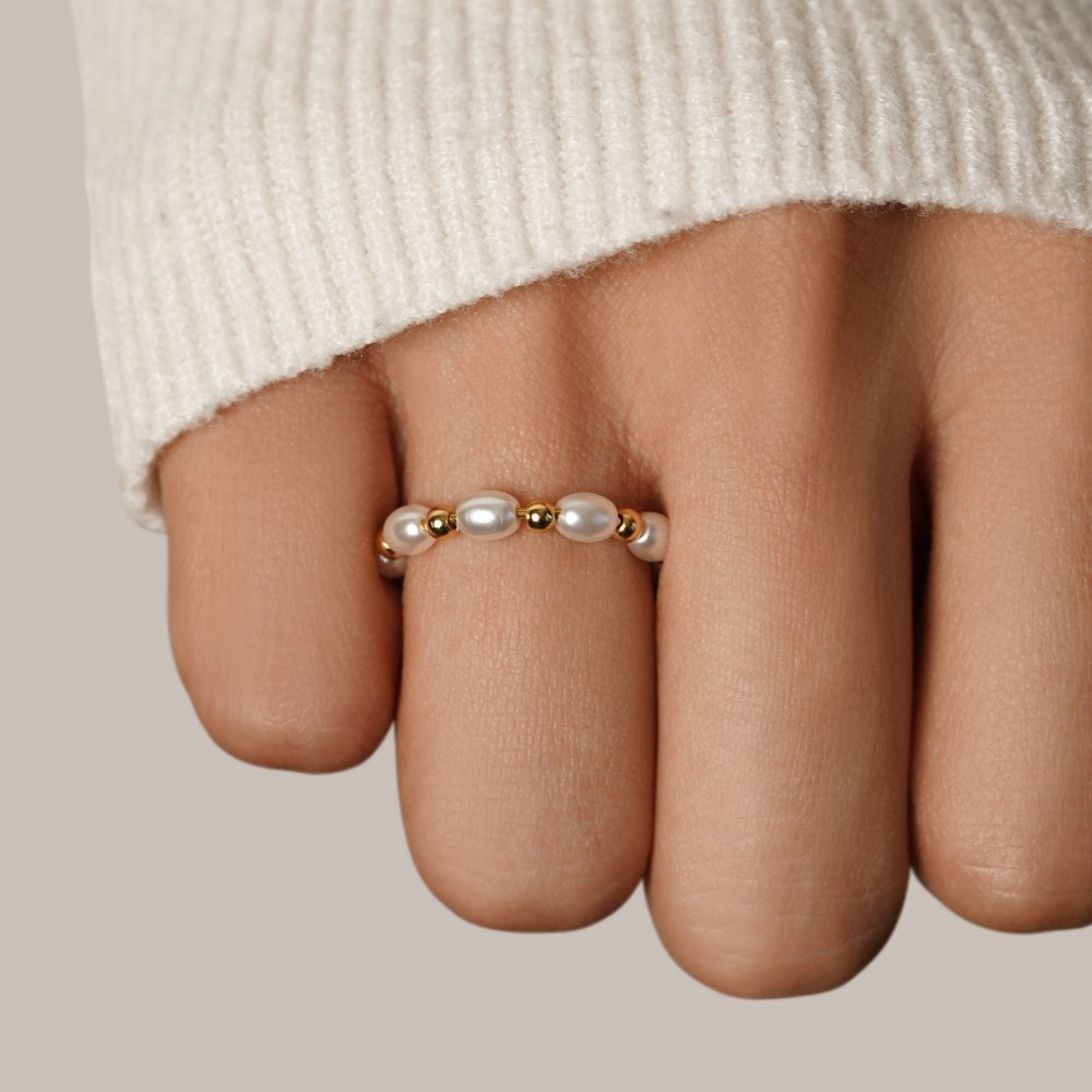 Kai Tiny Single Pearl on a Fine Band Ring