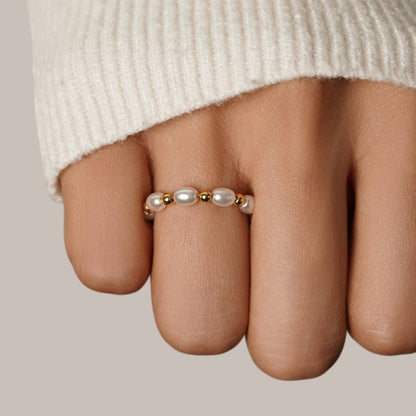 Kai Tiny Single Pearl on a Fine Band Ring