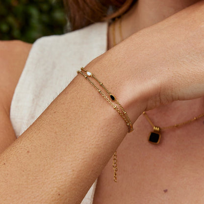 Stacked Strand Black and White Bead Bracelet