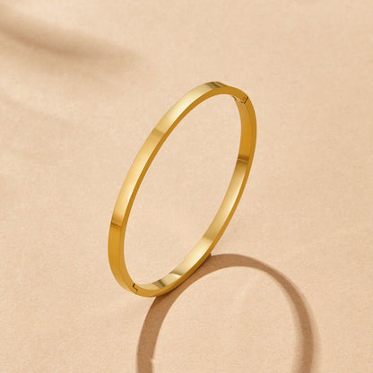 Rina Warm Polished Gold-Tone Round Bangle