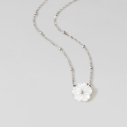 White Blossom Charm on a Silver-Tone Chain Necklace