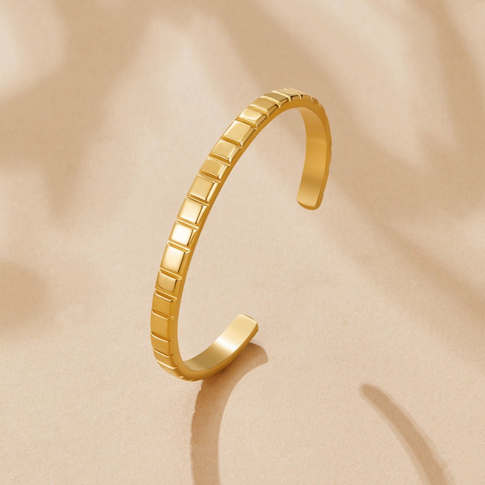 Tasha Fine Ribbing Gold-Tone Bangle
