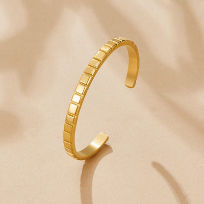 Tasha Fine Ribbing Gold-Tone Bangle