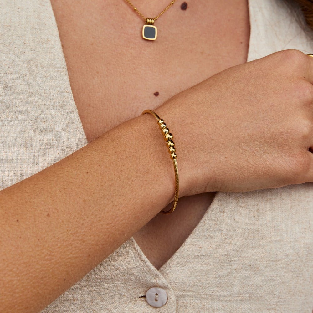 Yuri Small Beaded Edge Rounded Gold-Tone Bangle